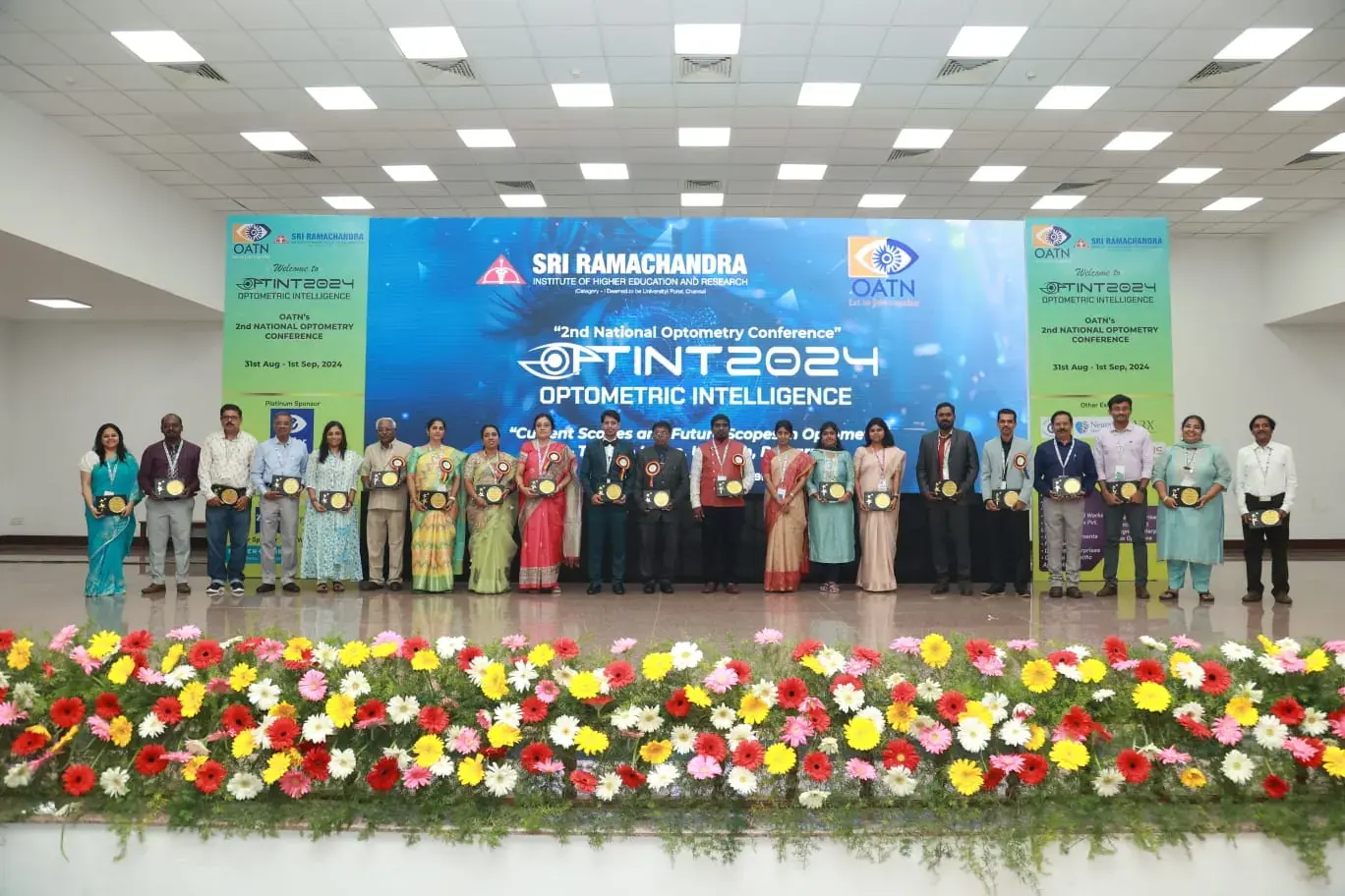 Speakers and award recipients at OPTINT 2024