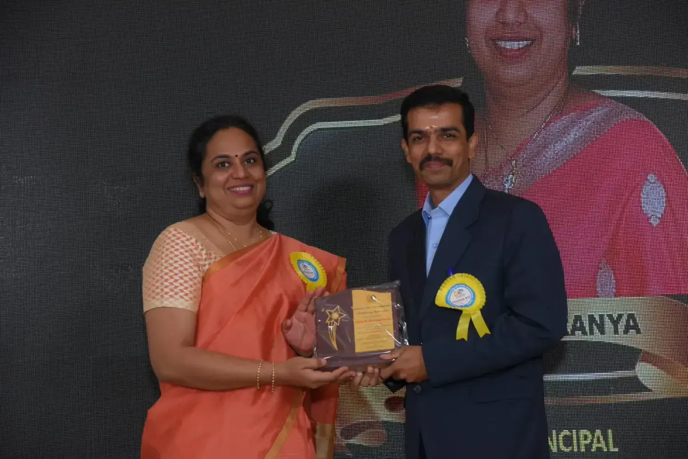 Receiving a plaque at Opto Vista 2022