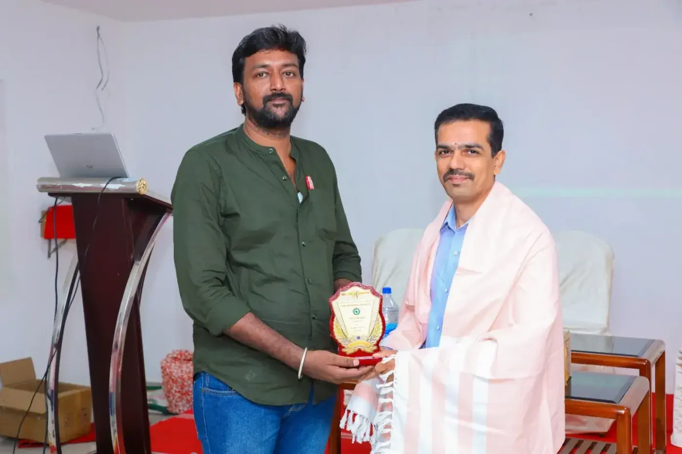 Felicitation with a plaque and shawl